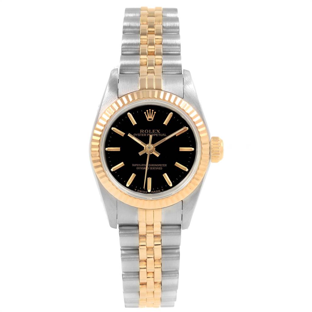 The image shows a front view of a gold and silver Rolex Oyster Perpetual 67193 Women
s Steel and Gold (two tone) Black Dial 67193 Women
s Steel and Gold (two tone) Black Dial watch, highlighting its face, bezel, crown, and band.