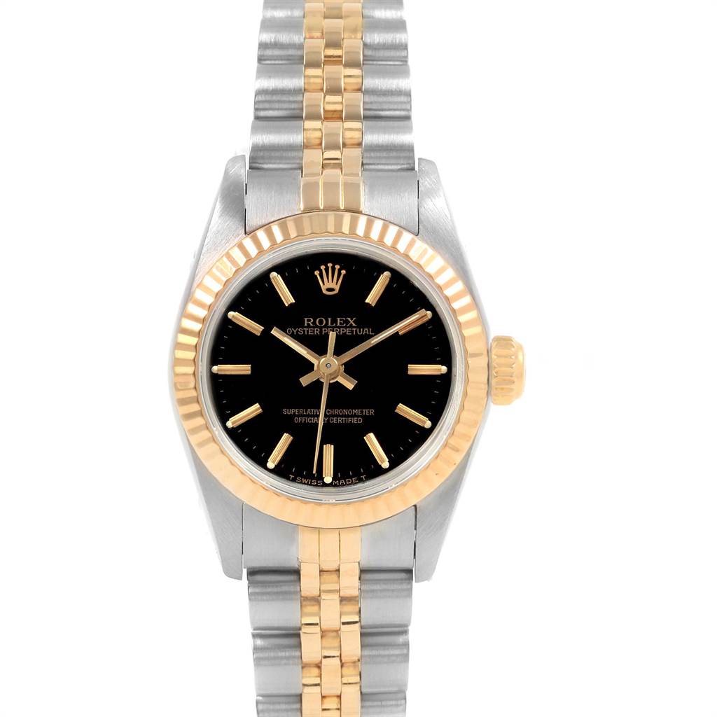 This image shows the front view of a Rolex Oyster Perpetual 67193 Women
s Steel and Gold (two tone) Black Dial 67193 Women
s Steel and Gold (two tone) Black Dial watch, highlighting its black dial, gold markers, and two-tone bracelet.