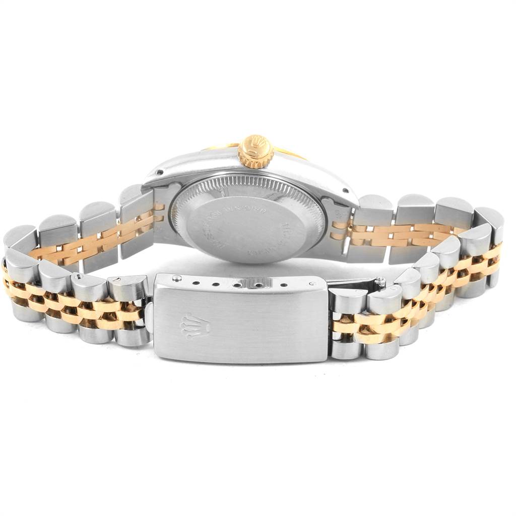 The image shows the back view of a Rolex Oyster Perpetual 67193 Women
s Steel and Gold (two tone) Black Dial 67193 Women
s Steel and Gold (two tone) Black Dial watch, highlighting the case back and bracelet clasp.