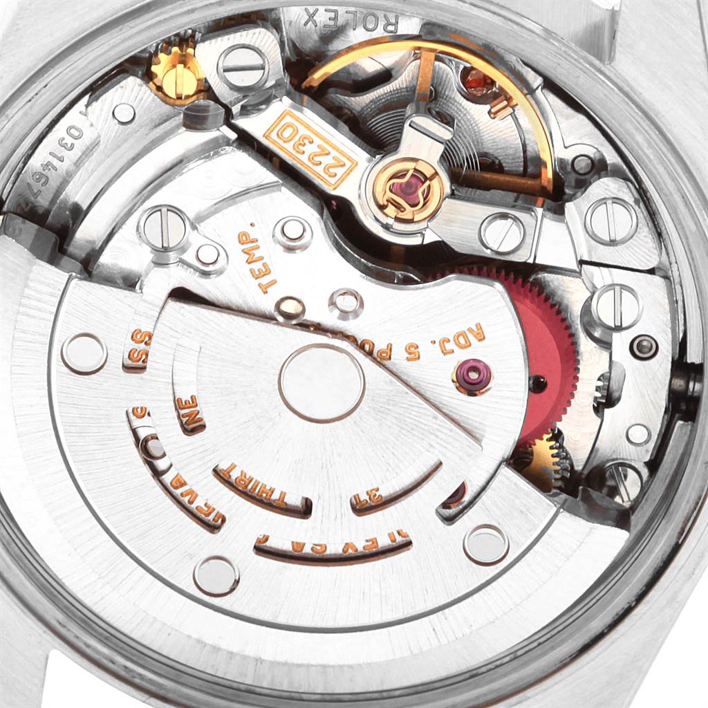 The image showcases the movement mechanism of a Rolex Oyster Perpetual 76080 Women
s Stainless Steel Pink Dial 76080 Women
s Stainless Steel Pink Dial model, viewed from the back.