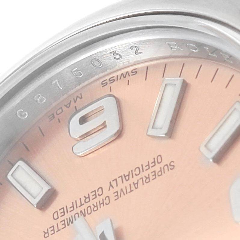 This image shows a close-up of the Rolex Oyster Perpetual 176200 Women's Stainless Steel Pink Dial 176200 Women's Stainless Steel Pink Dial watch, focusing on the dial and part of the bezel.