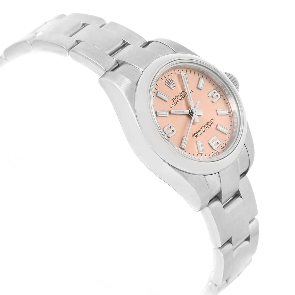 The Rolex Oyster Perpetual 176200 Women's Stainless Steel Pink Dial 176200 Women's Stainless Steel Pink Dial watch is shown at an oblique angle, highlighting the bracelet, bezel, and pink dial.