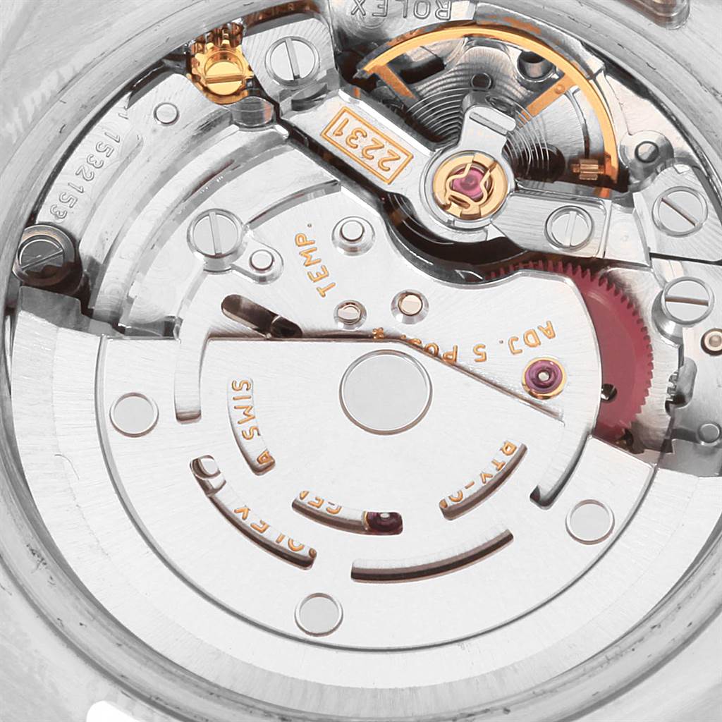 The image shows a close-up view of the movement mechanism inside a Rolex Oyster Perpetual 176234 Women
s Stainless Steel Silver Dial 176234 Women
s Stainless Steel Silver Dial watch.