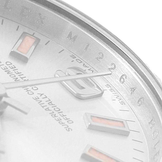 This close-up image of the Rolex Oyster Perpetual 176234 Women
s Stainless Steel Silver Dial 176234 Women
s Stainless Steel Silver Dial watch shows the dial, hour markers, and part of the bezel with numbers.