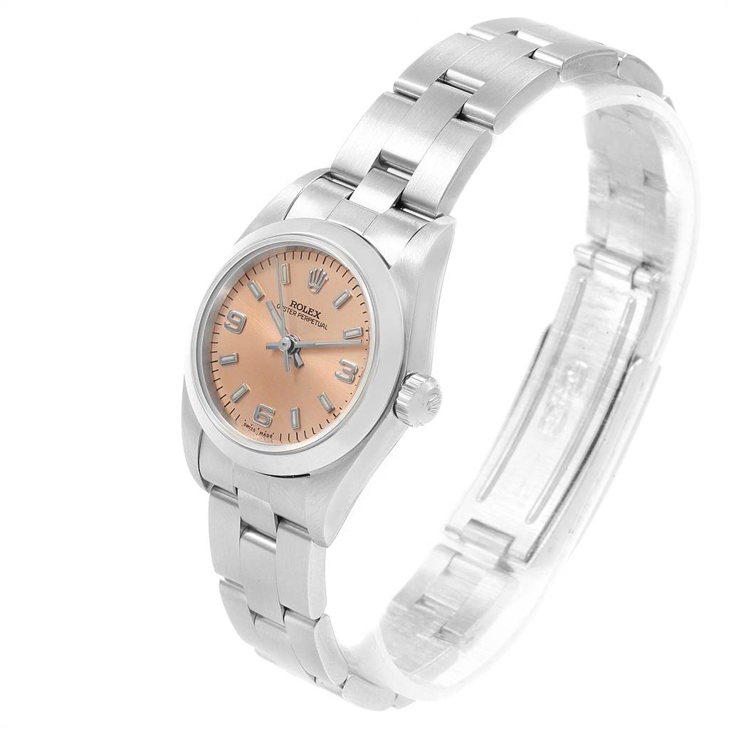 The image shows a side-angle view of the Rolex Oyster Perpetual 76080 Women
s Stainless Steel Pink Dial 76080 Women
s Stainless Steel Pink Dial watch, highlighting the dial, bracelet, and crown.