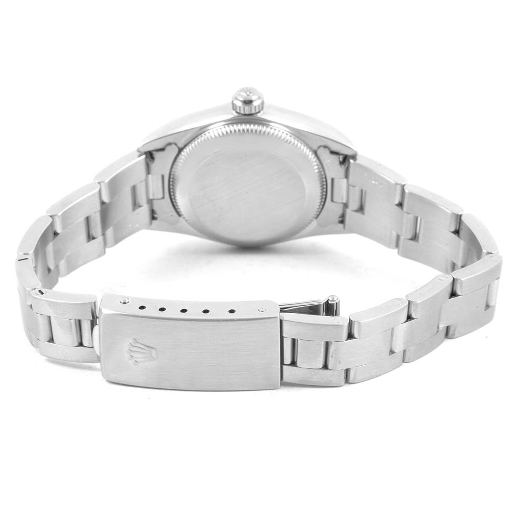 The image shows the clasp and inner side of the bracelet, along with the case back, of a Rolex Oyster Perpetual 76080 Women's Stainless Steel Silver Dial 76080 Women's Stainless Steel Silver Dial watch from the back angle.