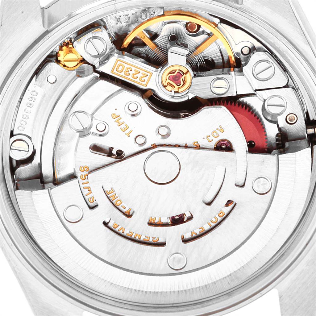 This image shows the intricate mechanical movement components of the Rolex Oyster Perpetual 76080 Women's Stainless Steel Silver Dial 76080 Women's Stainless Steel Silver Dial watch from a close-up, rear angle.