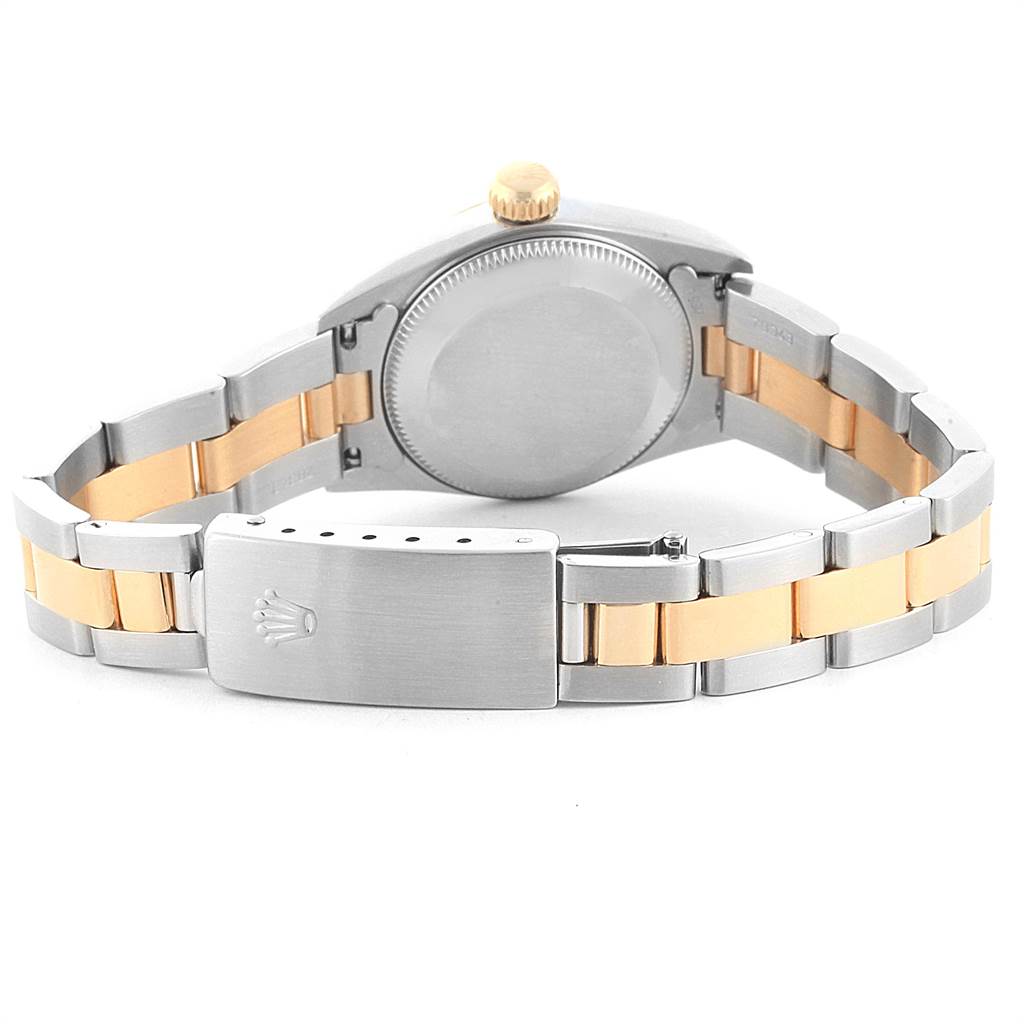 The image shows the back view of a Rolex Oyster Perpetual 67243 Women
s Steel and Gold (two tone) White Dial 67243 Women
s Steel and Gold (two tone) White Dial watch, highlighting the clasp and bracelet.