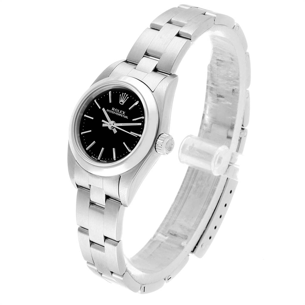 This image shows a side angle of the Rolex Oyster Perpetual 76080 Women
s Stainless Steel Black Dial 76080 Women
s Stainless Steel Black Dial watch, showcasing its bezel, dial, and bracelet.