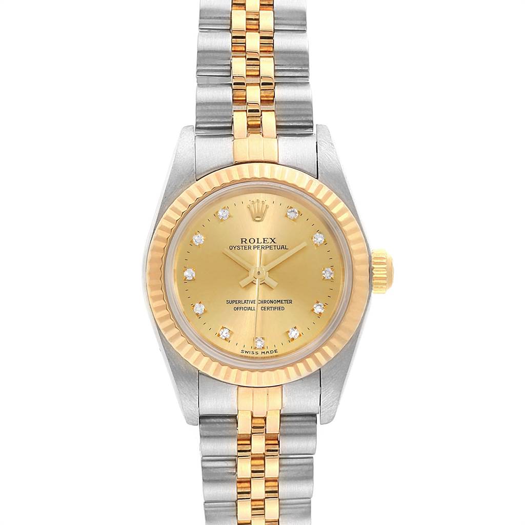 This is a frontal view of the Rolex Oyster Perpetual 76193 Women
s Steel and Gold (two tone) Champagne Dial 76193 Women
s Steel and Gold (two tone) Champagne Dial watch, showing the face, bezel, and bracelet.