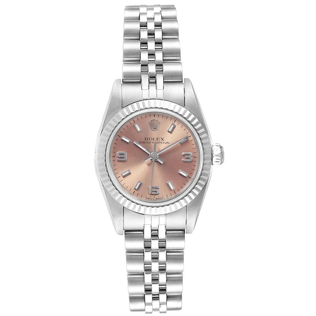 This image shows a Rolex Oyster Perpetual 76094 Women's Stainless Steel Pink Dial 76094 Women's Stainless Steel Pink Dial watch with a fluted bezel and Jubilée bracelet, viewed from the front.