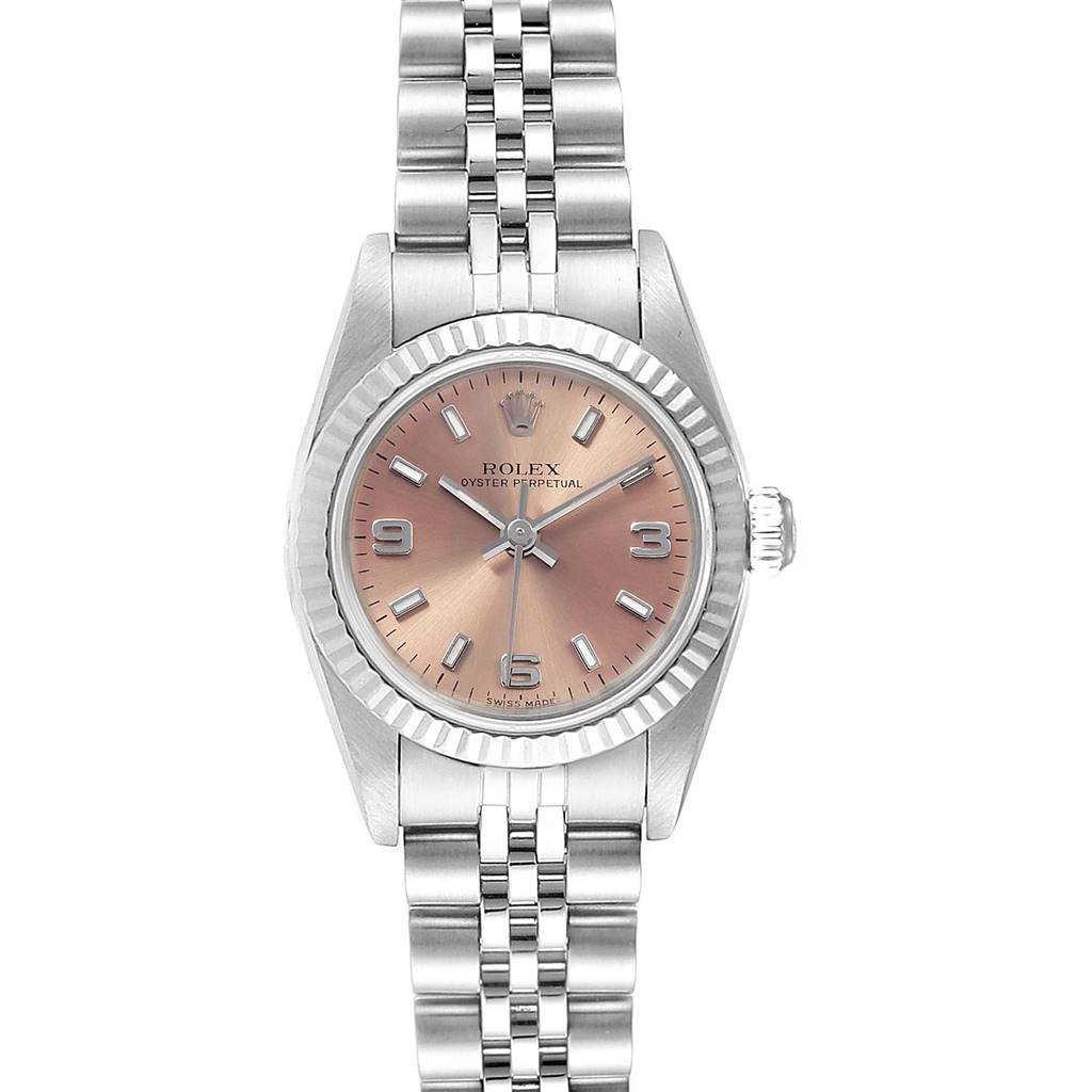 This image shows a front view of a Rolex Oyster Perpetual 76094 Women's Stainless Steel Pink Dial 76094 Women's Stainless Steel Pink Dial watch, highlighting its face, bezel, and metal bracelet.