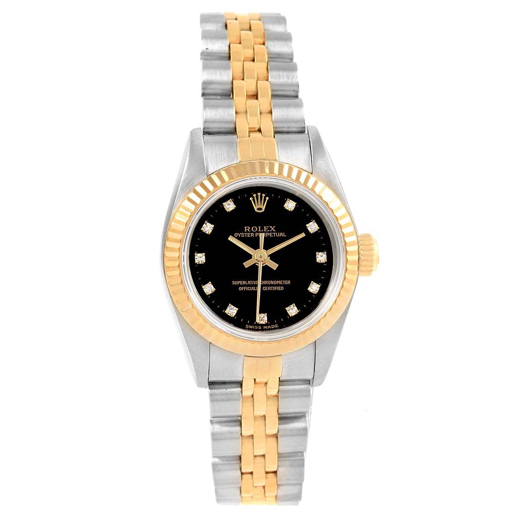 The Rolex Oyster Perpetual 67193 Women
s Steel and Gold (two tone) Black Dial 67193 Women
s Steel and Gold (two tone) Black Dial watch is shown from a top view, displaying the face, bezel, and two-tone bracelet.