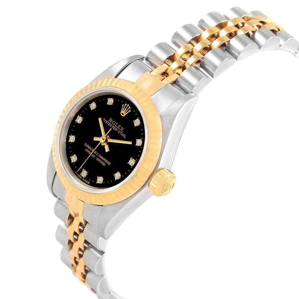 The Rolex Oyster Perpetual 67193 Women
s Steel and Gold (two tone) Black Dial 67193 Women
s Steel and Gold (two tone) Black Dial watch is shown at a slight angle, highlighting the dial, bezel, crown, and bracelet.