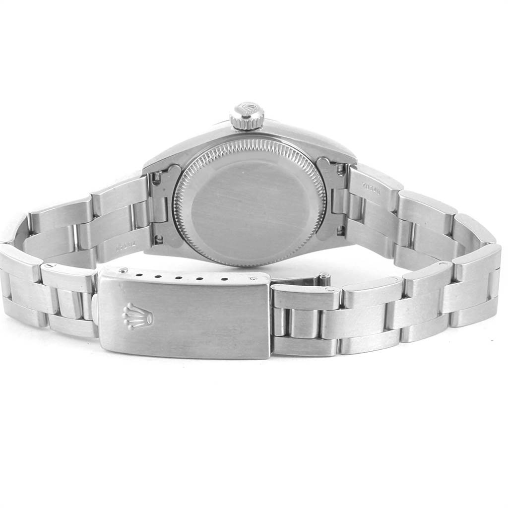 The image shows the back and bracelet of a Rolex Oyster Perpetual 67180 Women
s Stainless Steel Black Dial 67180 Women
s Stainless Steel Black Dial watch from a rear angle.