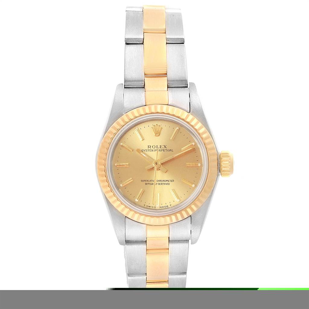 The image shows a frontal view of a Rolex Oyster Perpetual 67193 Women's Steel and Gold (two tone) Champagne Dial 67193 Women's Steel and Gold (two tone) Champagne Dial watch with a two-tone metal band and a gold dial.