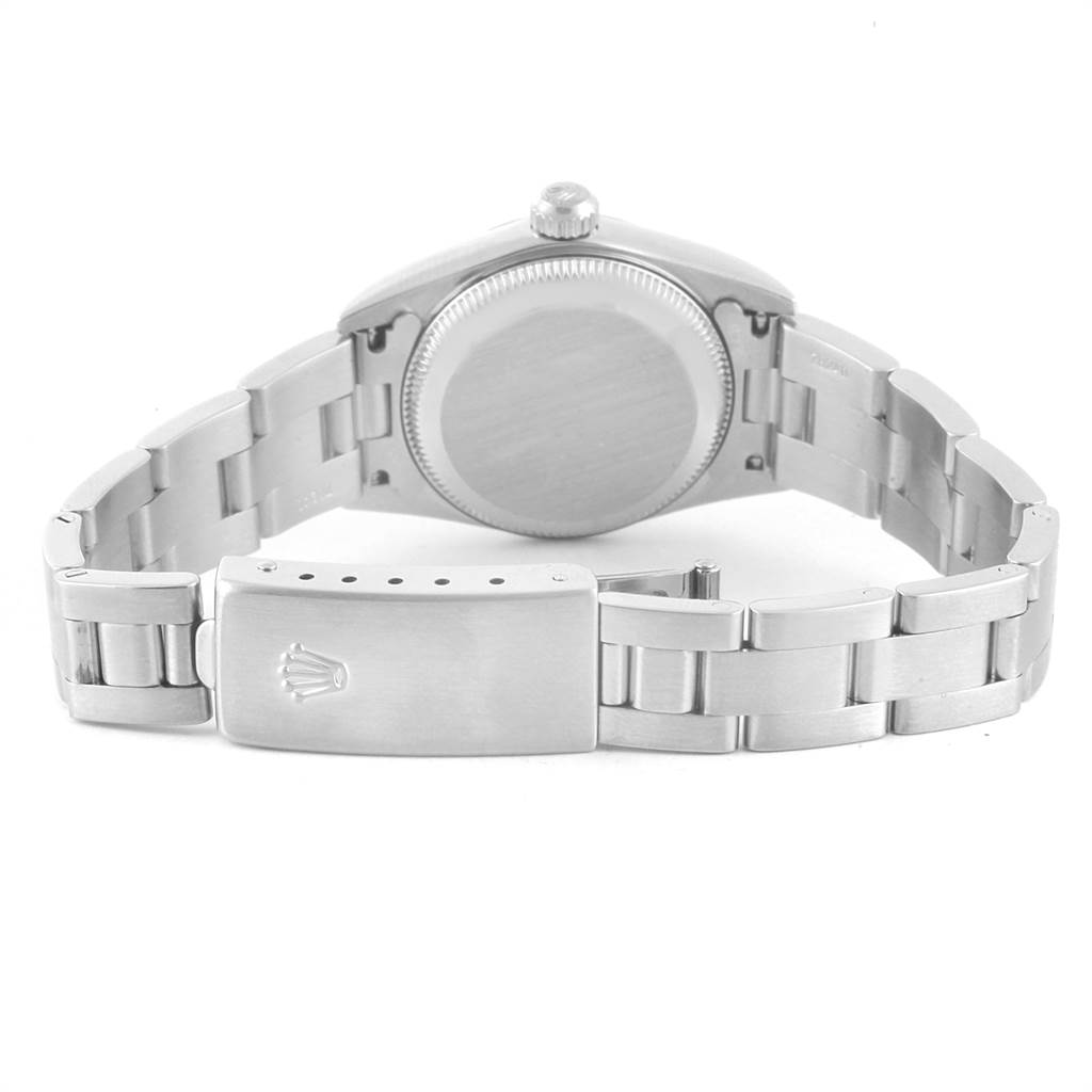 The image shows the back view of the Rolex Oyster Perpetual 76080 Women's Stainless Steel Pink Dial 76080 Women's Stainless Steel Pink Dial watch, highlighting the case back, crown, and clasp.