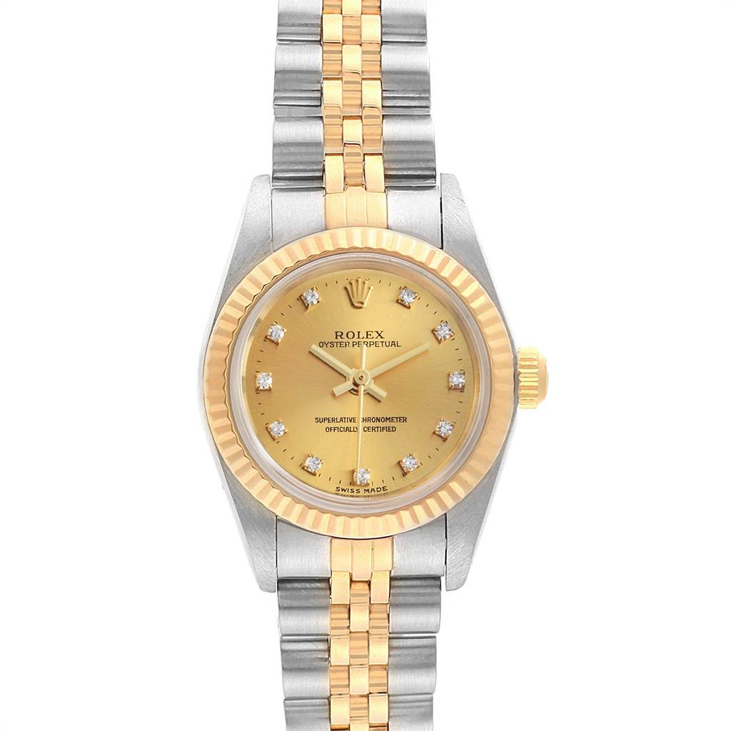 This image shows a front view of a Rolex Oyster Perpetual 76193 Women's Steel and Gold (two tone) Champagne Dial 76193 Women's Steel and Gold (two tone) Champagne Dial watch with a gold-and-silver bracelet and a gold dial.