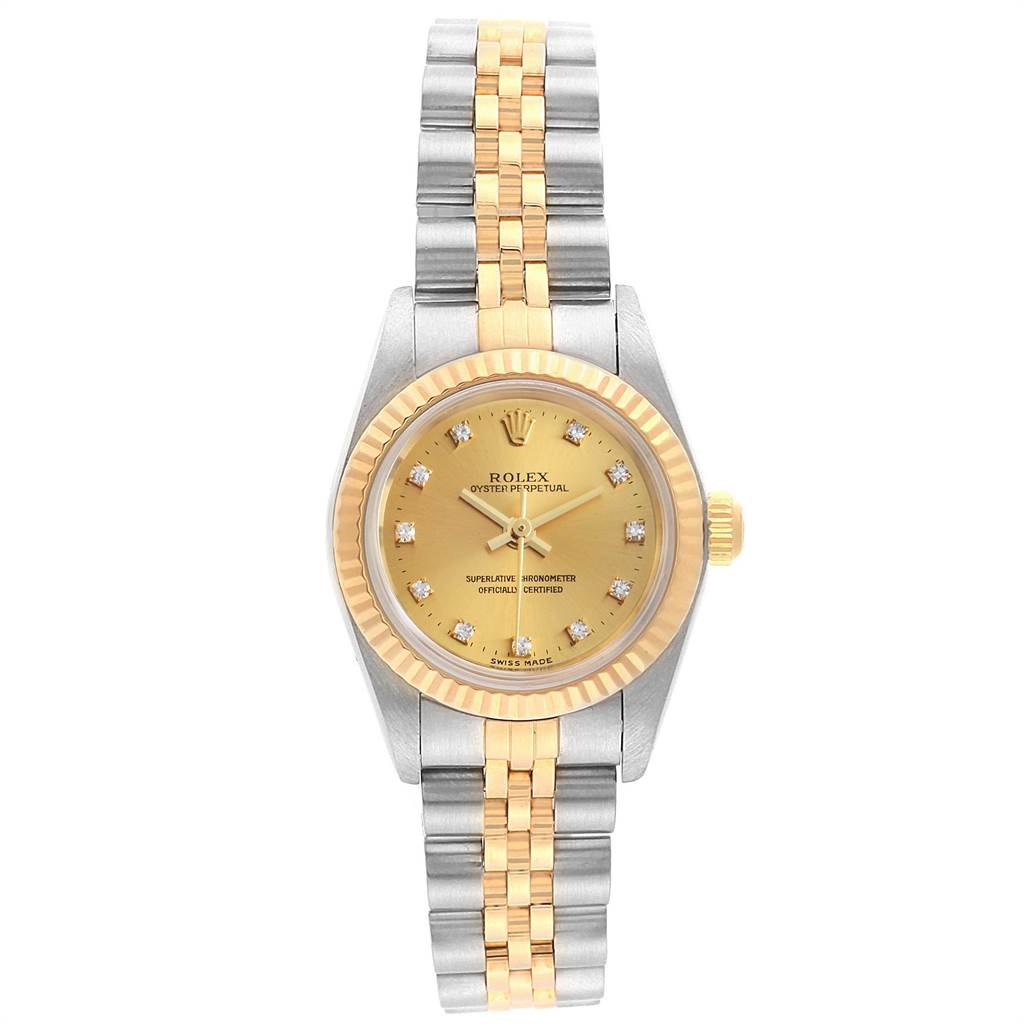 The Rolex Oyster Perpetual 76193 Women's Steel and Gold (two tone) Champagne Dial 76193 Women's Steel and Gold (two tone) Champagne Dial watch is shown from a front angle, displaying its dial, bezel, crown, and bracelet.