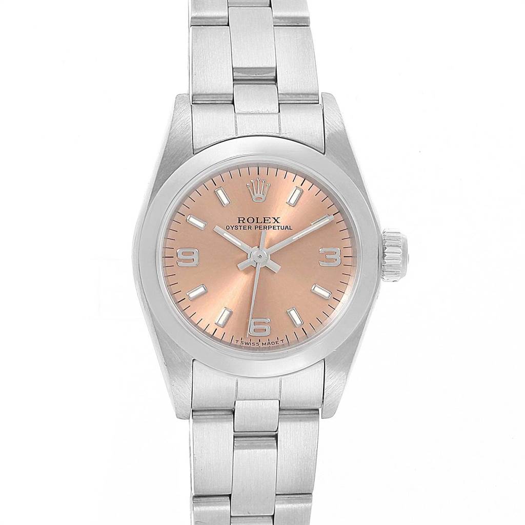 This image shows a Rolex Oyster Perpetual 67180 Women's Stainless Steel Pink Dial 67180 Women's Stainless Steel Pink Dial watch from a top-down angle, highlighting the face, bezel, and part of the bracelet.