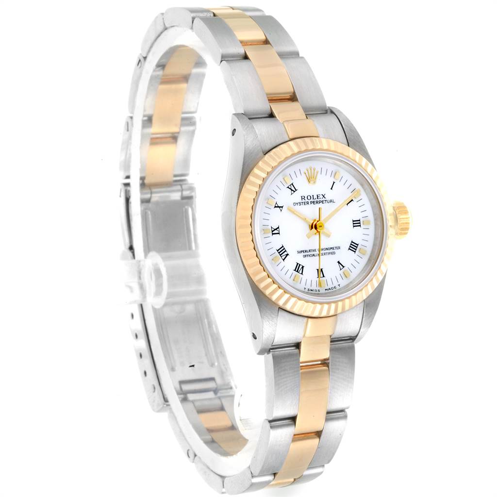 The image shows a Rolex Oyster Perpetual 67193 Women's Steel and Gold (two tone) White Dial 67193 Women's Steel and Gold (two tone) White Dial watch at a slight side angle, highlighting the bezel, face, and part of the bracelet.