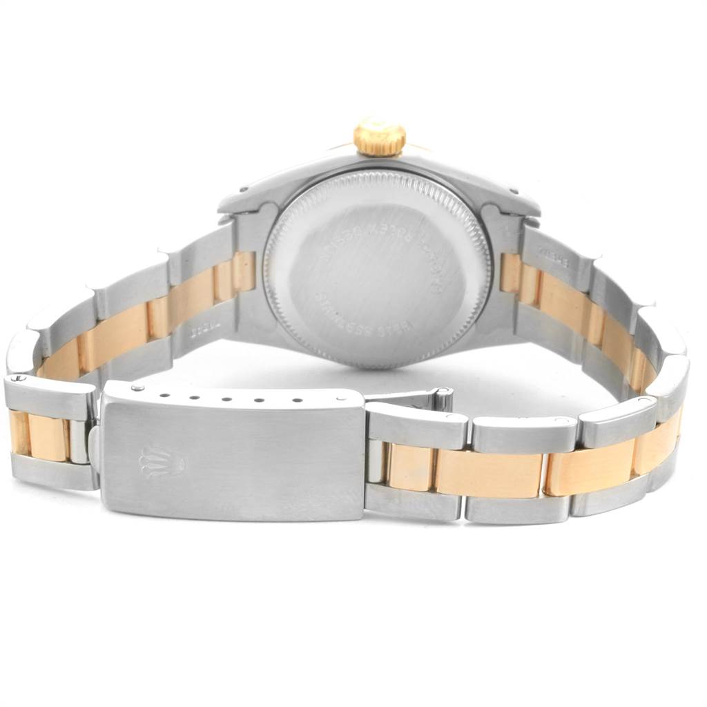 This image shows the back and part of the bracelet of the Rolex Oyster Perpetual 67193 Women's Steel and Gold (two tone) White Dial 67193 Women's Steel and Gold (two tone) White Dial watch, highlighting the clasp and case back.