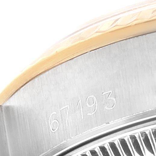 This is a close-up angle showing the model number "67193" on the case of a Rolex Oyster Perpetual 67193 Women's Steel and Gold (two tone) White Dial 67193 Women's Steel and Gold (two tone) White Dial watch.