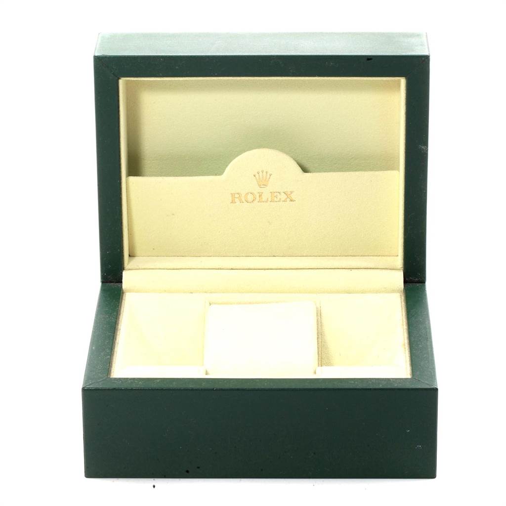 This image shows an open green and beige Rolex watch box designed for the Oyster Perpetual model.
