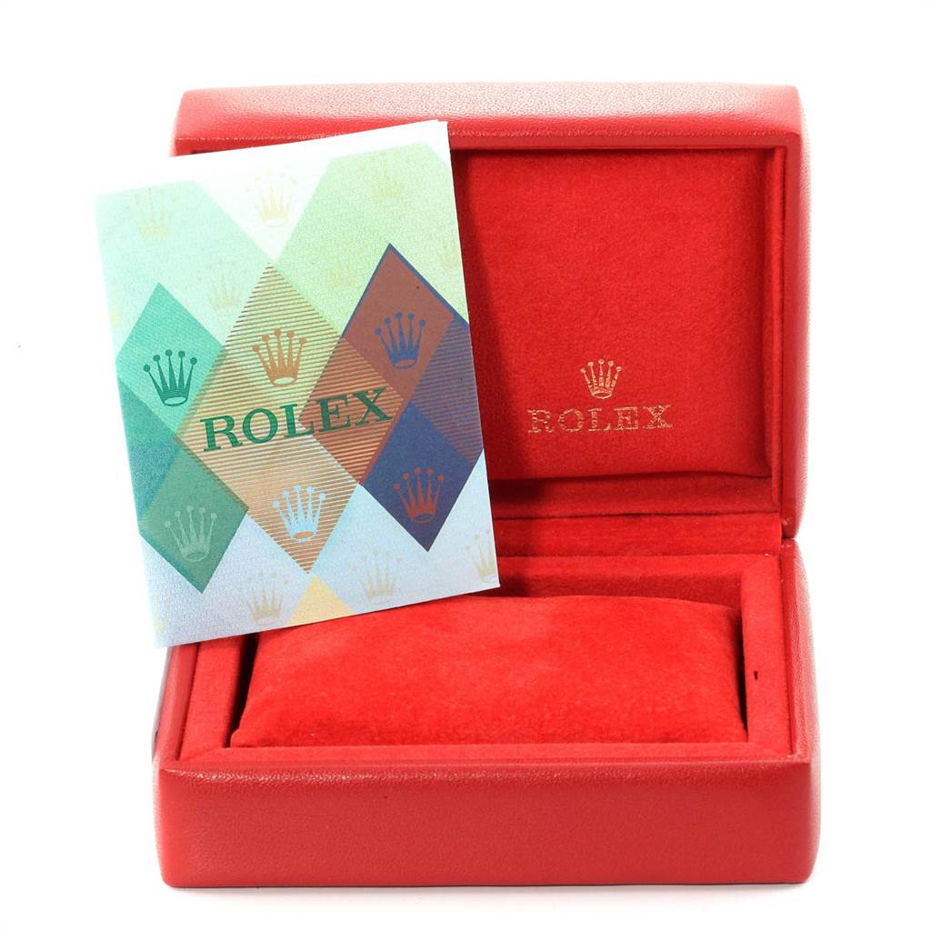 The image shows a Rolex Oyster Perpetual 76030 Women's Stainless Steel Pink Dial 76030 Women's Stainless Steel Pink Dial watch box and booklet from a front angle.