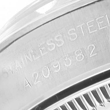 The image shows a close-up of the stainless steel back with engravings of a Rolex Oyster Perpetual 76080 Women's Stainless Steel Pink Dial 76080 Women's Stainless Steel Pink Dial watch.
