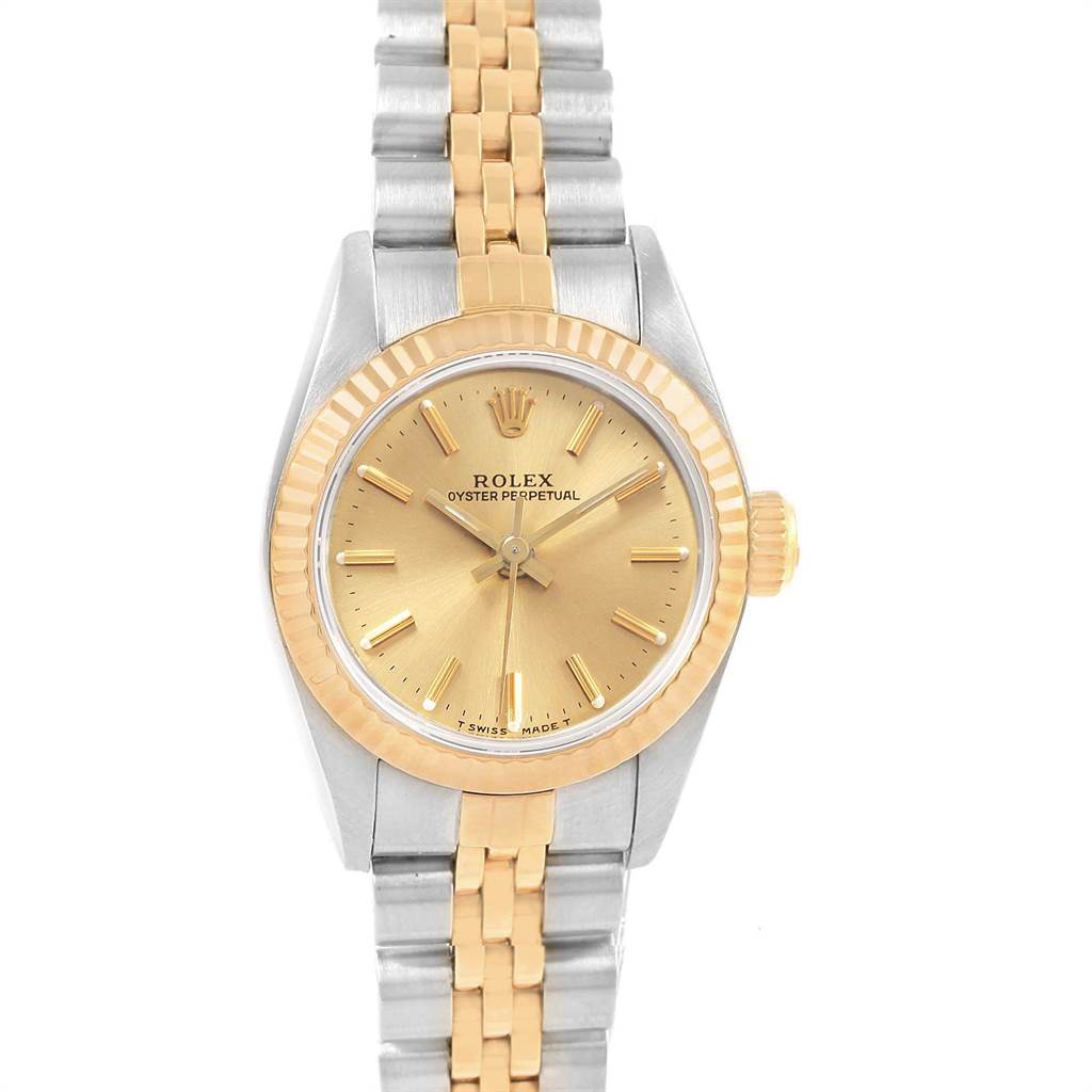 The image shows a front view of a Rolex Oyster Perpetual 67193 Women's Steel and Gold (two tone) Champagne Dial 67193 Women's Steel and Gold (two tone) Champagne Dial watch, highlighting its gold dial, bezel, and bi-metal bracelet.