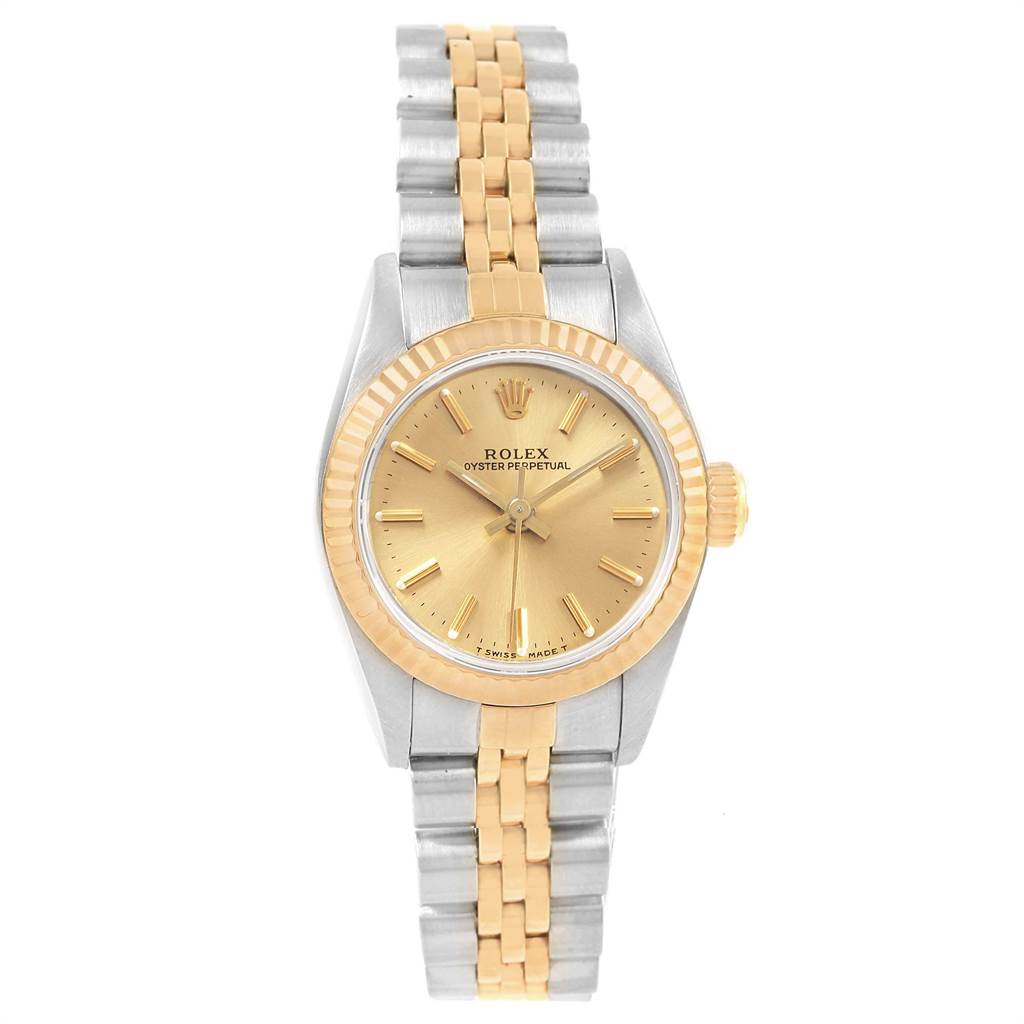 The image shows a front view of a Rolex Oyster Perpetual 67193 Women's Steel and Gold (two tone) Champagne Dial 67193 Women's Steel and Gold (two tone) Champagne Dial watch, showcasing its dial, bezel, crown, and bracelet.