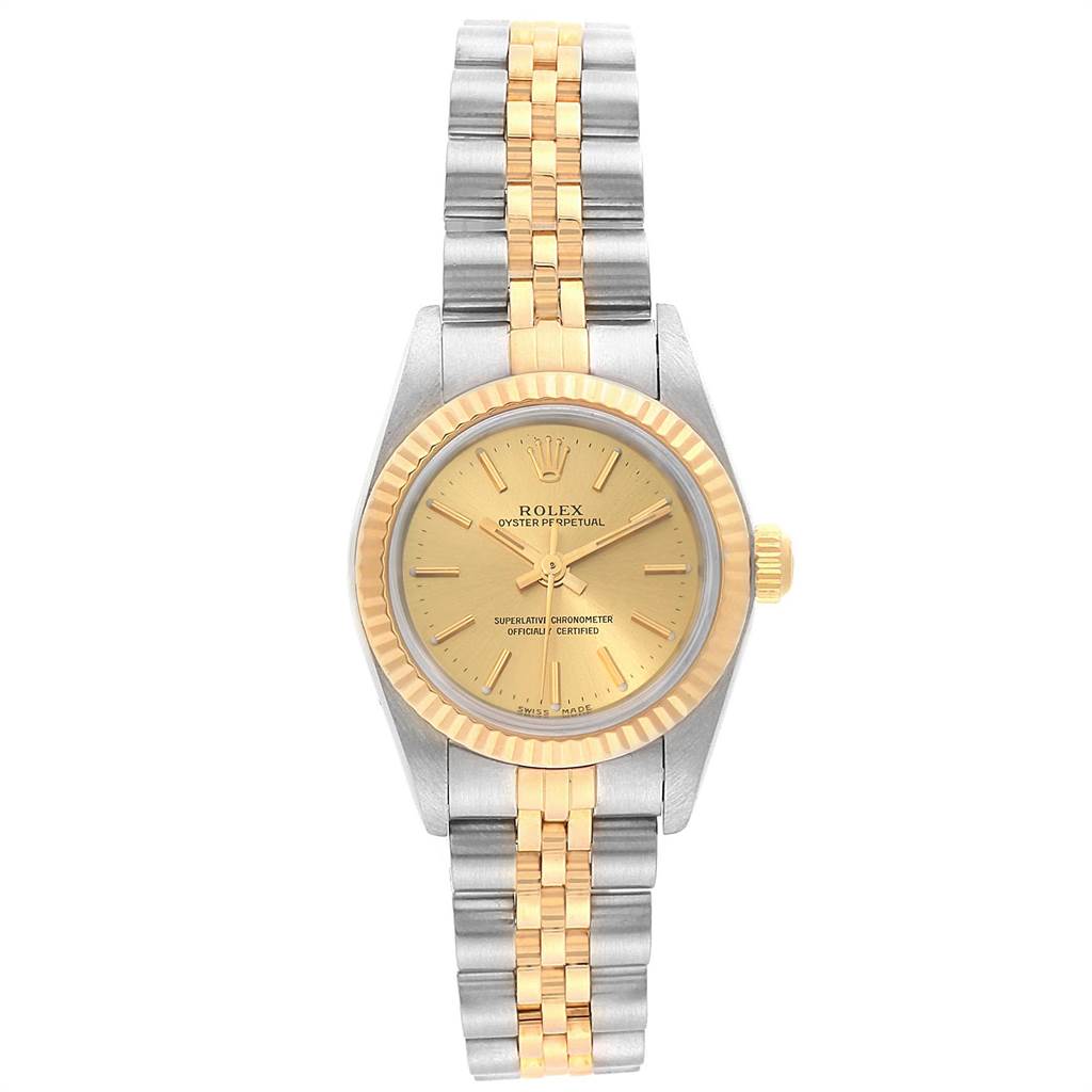 This image shows a front view of the Rolex Oyster Perpetual 76193 Women's Steel and Gold (two tone) Champagne Dial 76193 Women's Steel and Gold (two tone) Champagne Dial watch, highlighting its dial, bezel, and two-tone metal bracelet.