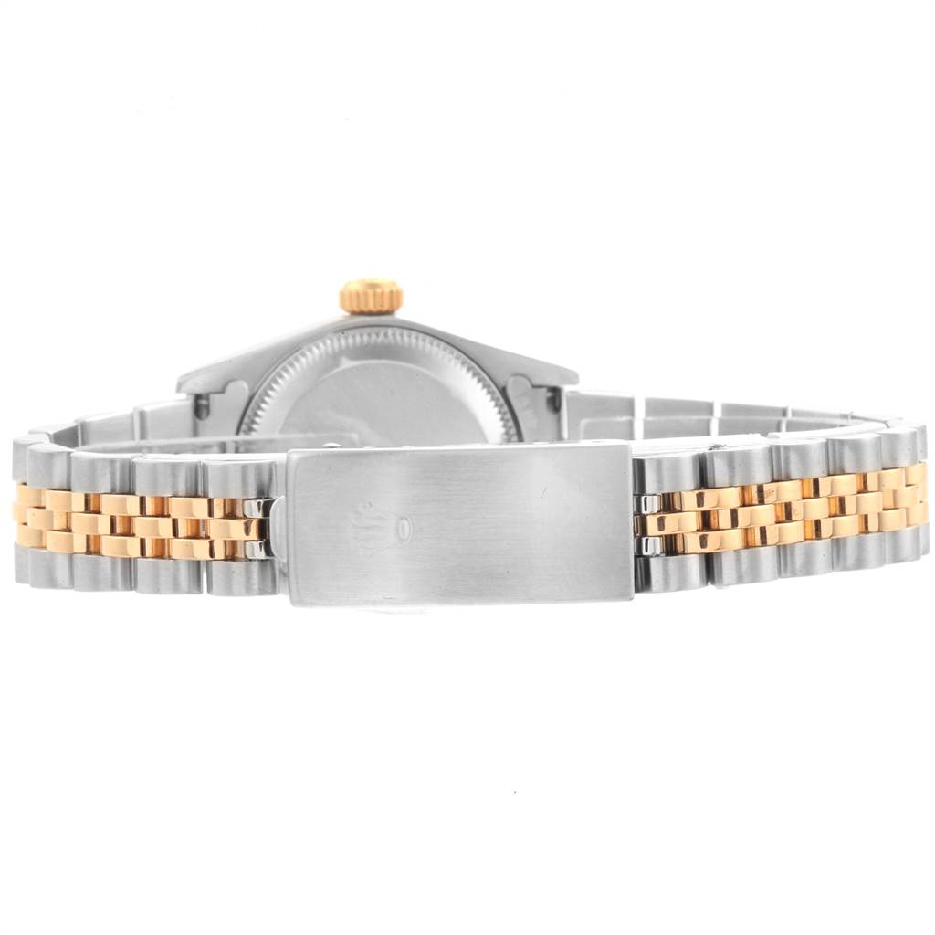 The image shows the clasp, bracelet, and caseback of a Rolex Oyster Perpetual 76193 Women's Steel and Gold (two tone) Champagne Dial 76193 Women's Steel and Gold (two tone) Champagne Dial watch from the rear angle.
