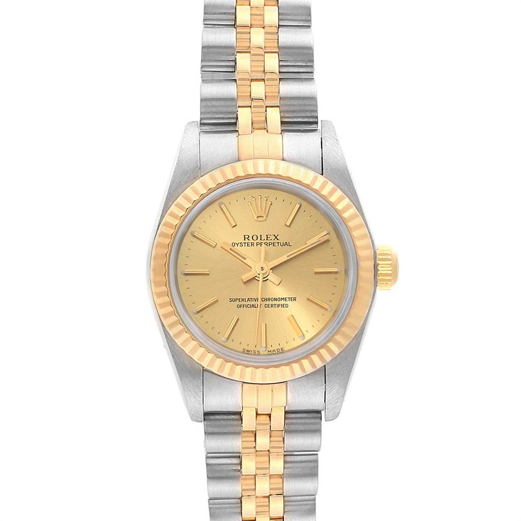 The image shows a frontal view of a Rolex Oyster Perpetual 76193 Women's Steel and Gold (two tone) Champagne Dial 76193 Women's Steel and Gold (two tone) Champagne Dial watch with a gold and silver two-tone bracelet and gold bezel.