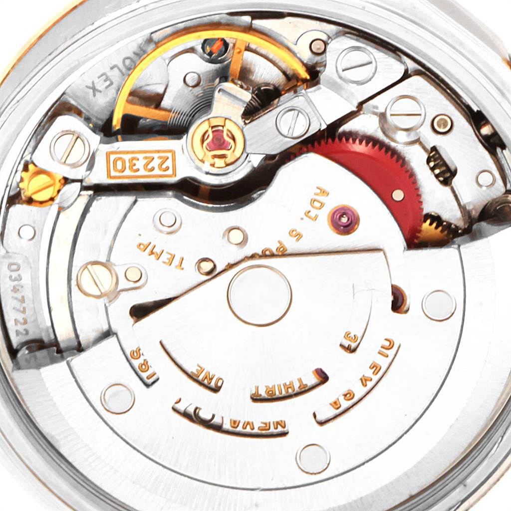 This image shows the internal mechanics and movement parts of a Rolex Oyster Perpetual 76193 Women's Steel and Gold (two tone) Champagne Dial 76193 Women's Steel and Gold (two tone) Champagne Dial watch.