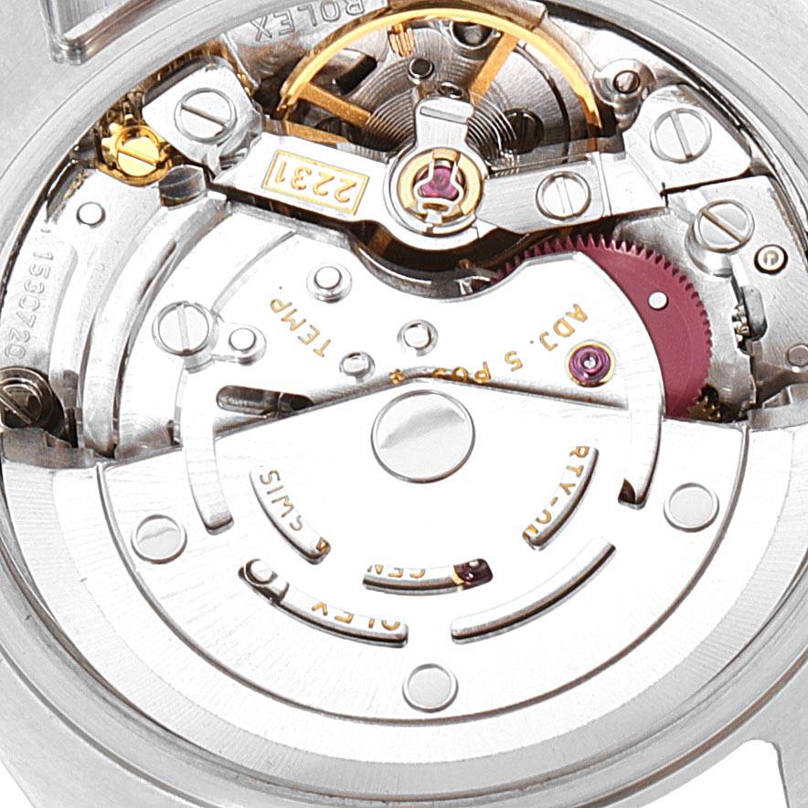 This image shows a close-up view of the inner automatic movement mechanism of a Rolex Oyster Perpetual 176234 Women's Stainless Steel Silver Dial 176234 Women's Stainless Steel Silver Dial watch.