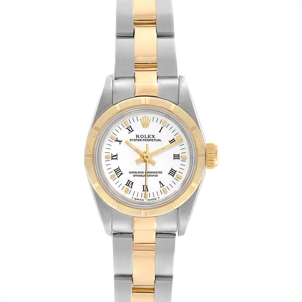 This image shows a Rolex Oyster Perpetual 67233 Women's Steel and Gold (two tone) White Dial 67233 Women's Steel and Gold (two tone) White Dial watch from a front angle, highlighting the dial, bezel, crown, and two-tone bracelet.