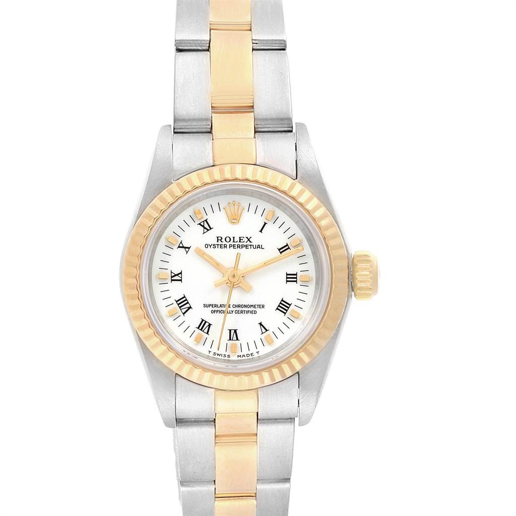 The Rolex Oyster Perpetual 67193 Women's Steel and Gold (two tone) White Dial 67193 Women's Steel and Gold (two tone) White Dial watch is shown from a top-down angle, revealing the face, bezel, and bracelet.