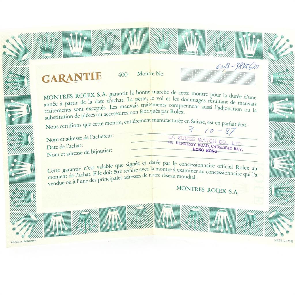 This is an image of a warranty certificate for a Rolex Oyster Perpetual 67193 Women's Steel and Gold (two tone) Champagne Dial 67193 Women's Steel and Gold (two tone) Champagne Dial watch, showing purchase details and terms in French.