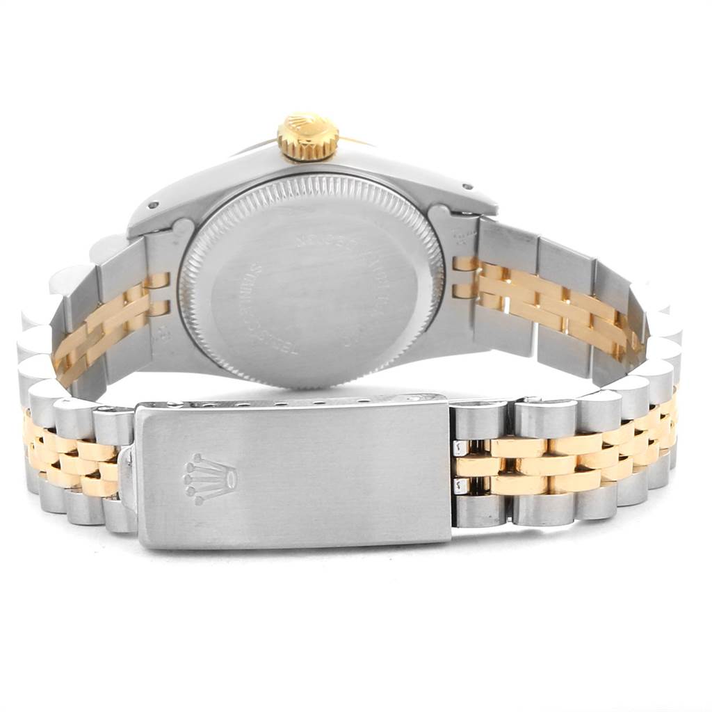The image shows the back of a Rolex Oyster Perpetual 67193 Women's Steel and Gold (two tone) Champagne Dial 67193 Women's Steel and Gold (two tone) Champagne Dial watch, highlighting the case back, crown, and two-tone bracelet with clasp.