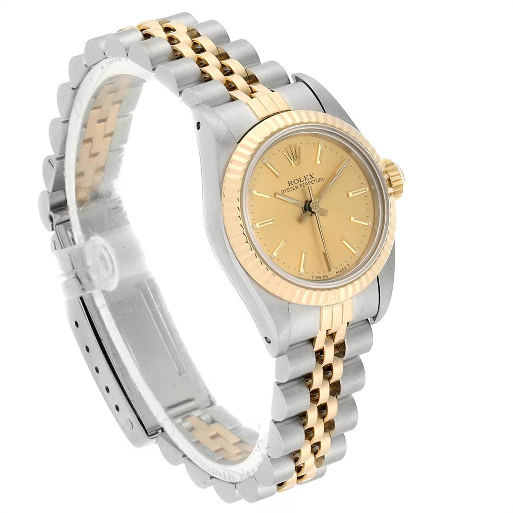 The Rolex Oyster Perpetual 67193 Women's Steel and Gold (two tone) Champagne Dial 67193 Women's Steel and Gold (two tone) Champagne Dial watch is shown at a slight angle, displaying the dial, bezel, and two-tone bracelet.