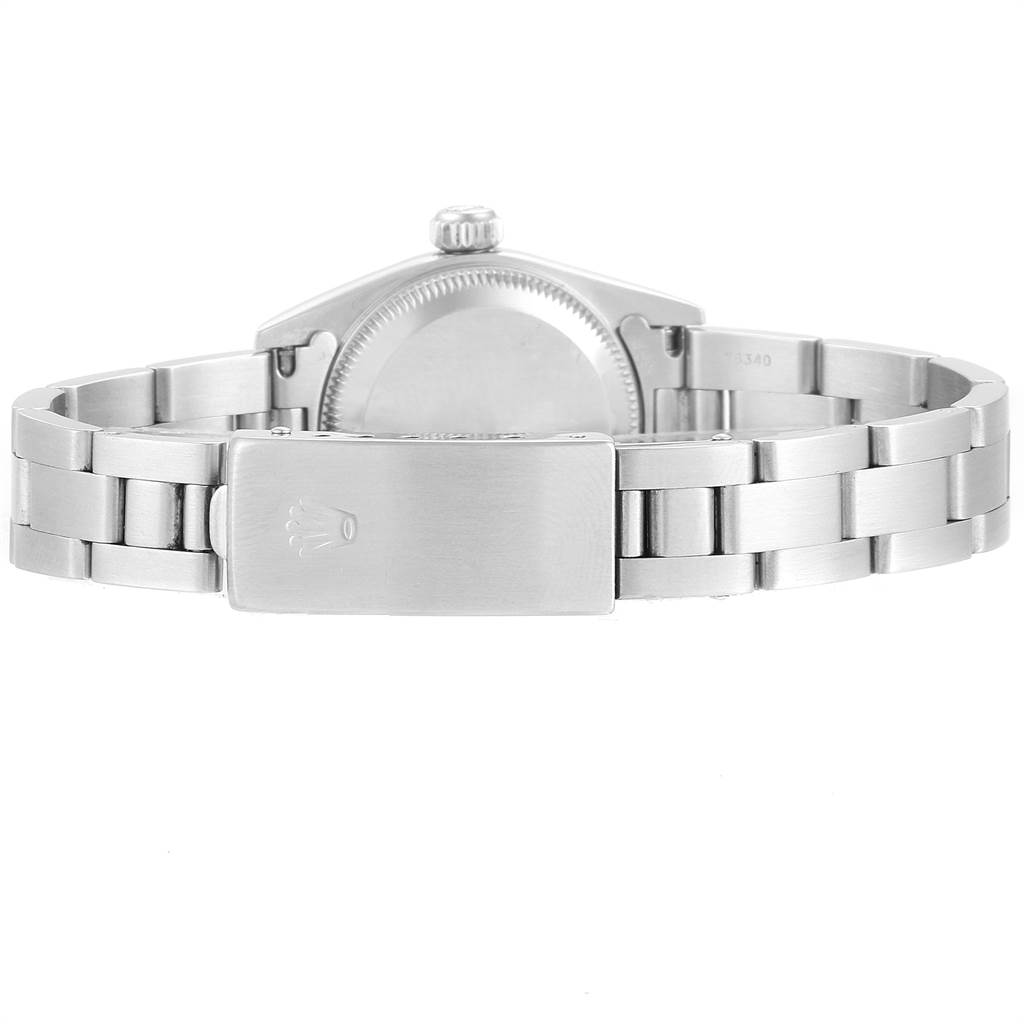 This image shows the back of the Rolex Oyster Perpetual 67180 Women's Stainless Steel Pink Dial 67180 Women's Stainless Steel Pink Dial watch, including the case, crown, and bracelet with the clasp.