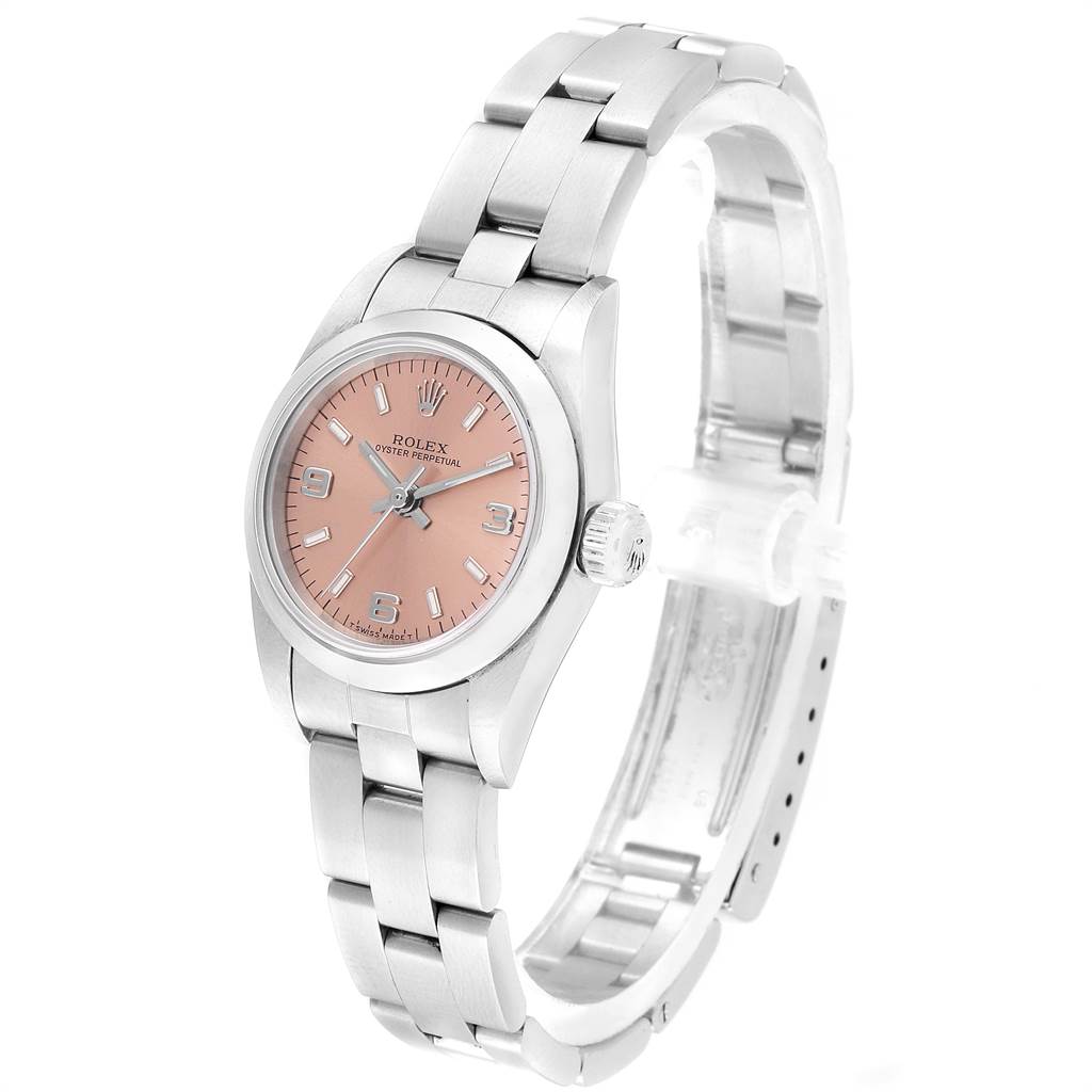 The Rolex Oyster Perpetual 67180 Women's Stainless Steel Pink Dial 67180 Women's Stainless Steel Pink Dial watch is shown from a three-quarter angle, displaying the face, bezel, crown, and bracelet.