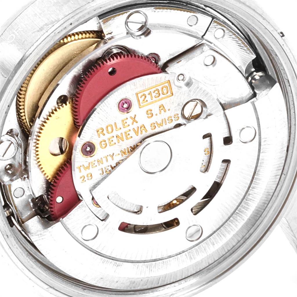 This image shows the inner mechanical movement of a Rolex Oyster Perpetual 67180 Women's Stainless Steel Pink Dial 67180 Women's Stainless Steel Pink Dial watch from a top-down angle.