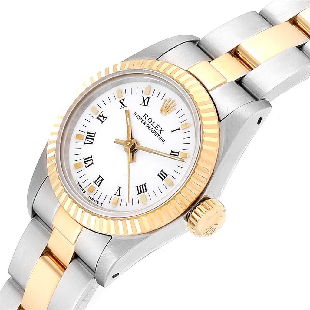 This image shows a close-up, angled view of a Rolex Oyster Perpetual 67193 Women's Steel and Gold (two tone) White Dial 67193 Women's Steel and Gold (two tone) White Dial watch, highlighting the gold bezel, crown, and part of the bracelet.