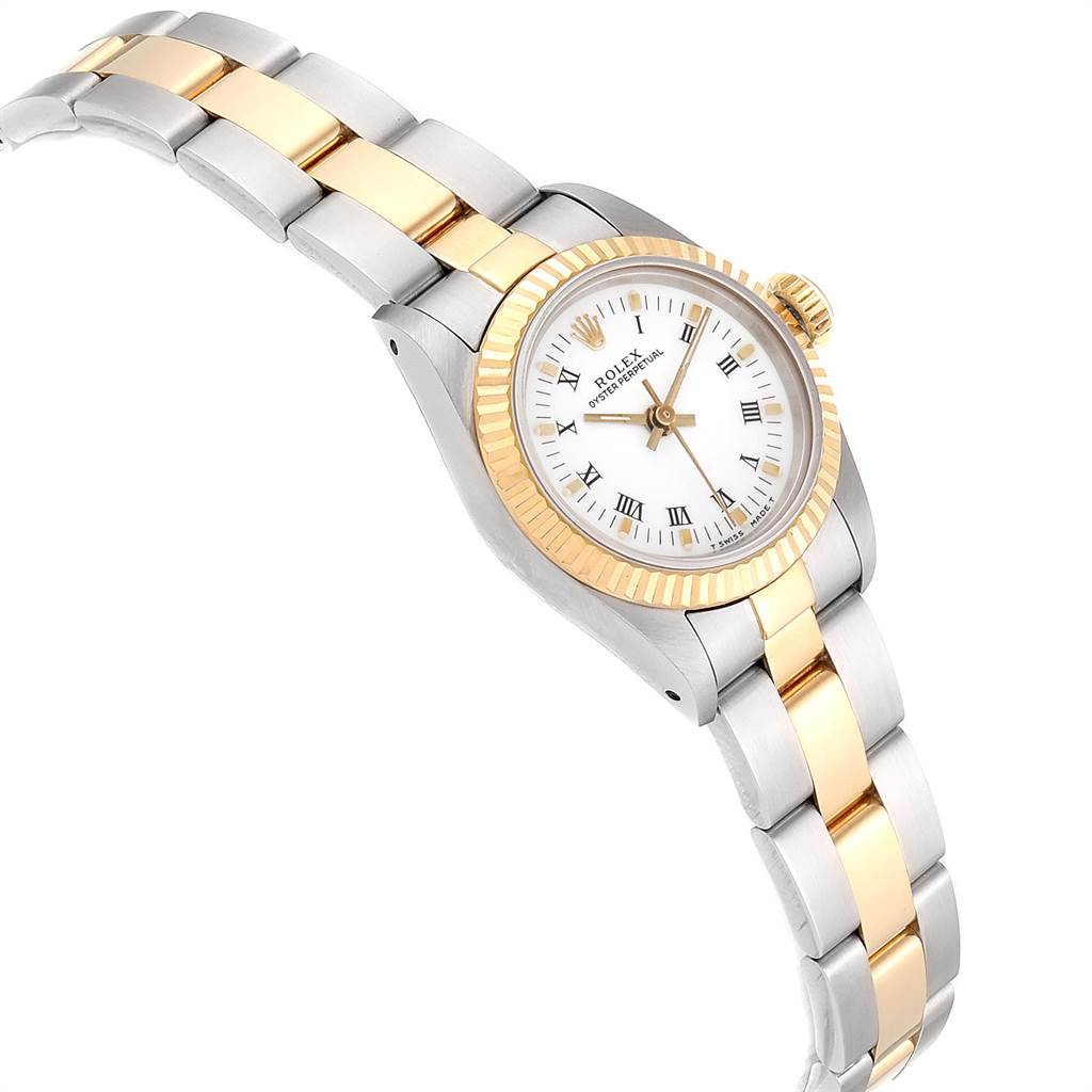 The image shows a Rolex Oyster Perpetual 67193 Women's Steel and Gold (two tone) White Dial 67193 Women's Steel and Gold (two tone) White Dial watch at a tilted angle, highlighting the two-tone bracelet and fluted bezel.