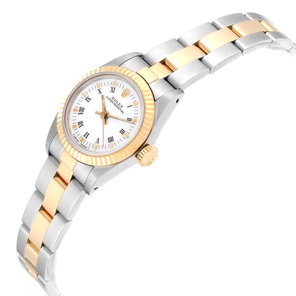 The image shows a Rolex Oyster Perpetual 67193 Women's Steel and Gold (two tone) White Dial 67193 Women's Steel and Gold (two tone) White Dial watch angled to the left, displaying the dial, bezel, crown, and two-tone bracelet.