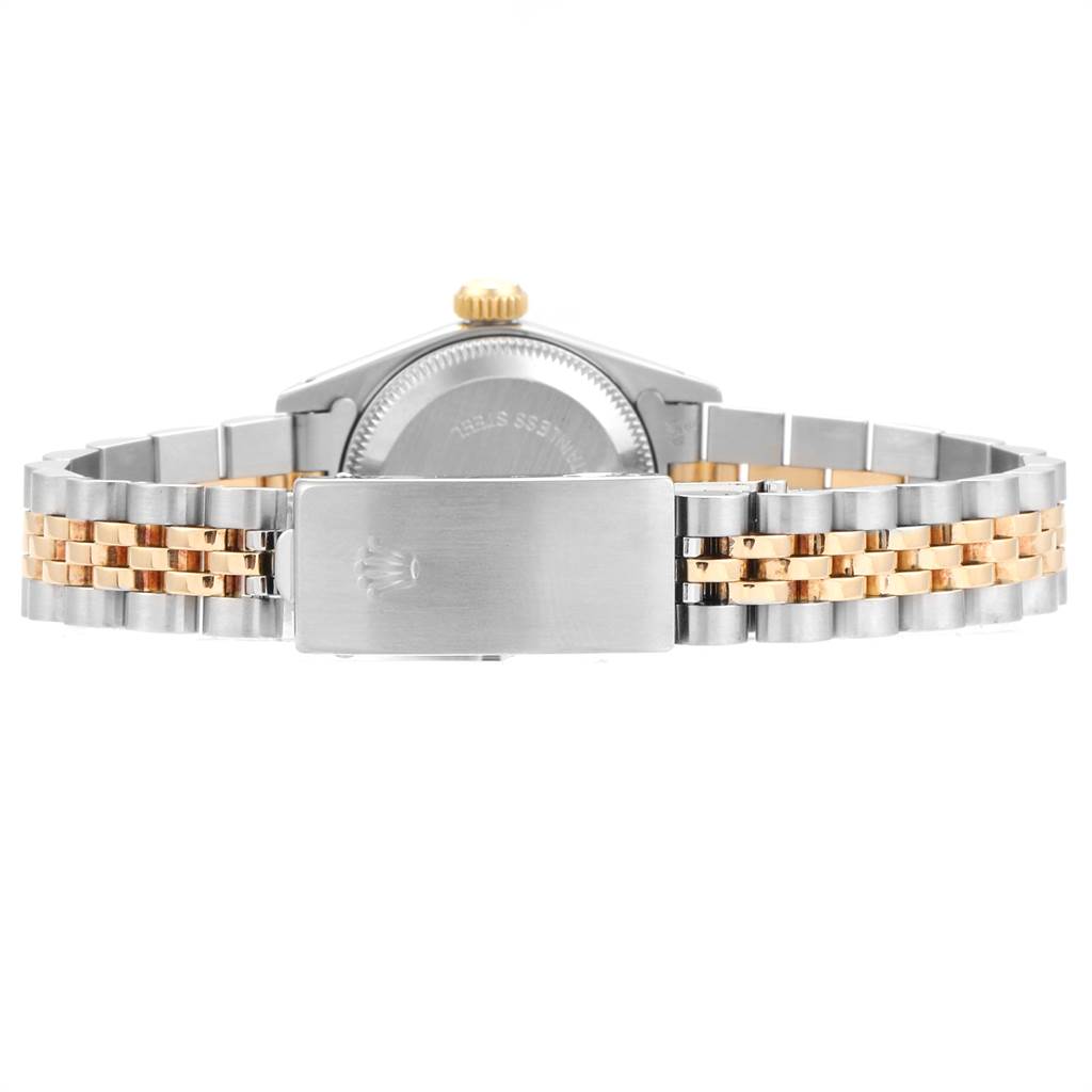 The image shows the back view of a Rolex Oyster Perpetual 67193 Women's Steel and Gold (two tone) White Dial 67193 Women's Steel and Gold (two tone) White Dial watch, highlighting its two-tone bracelet and clasp.