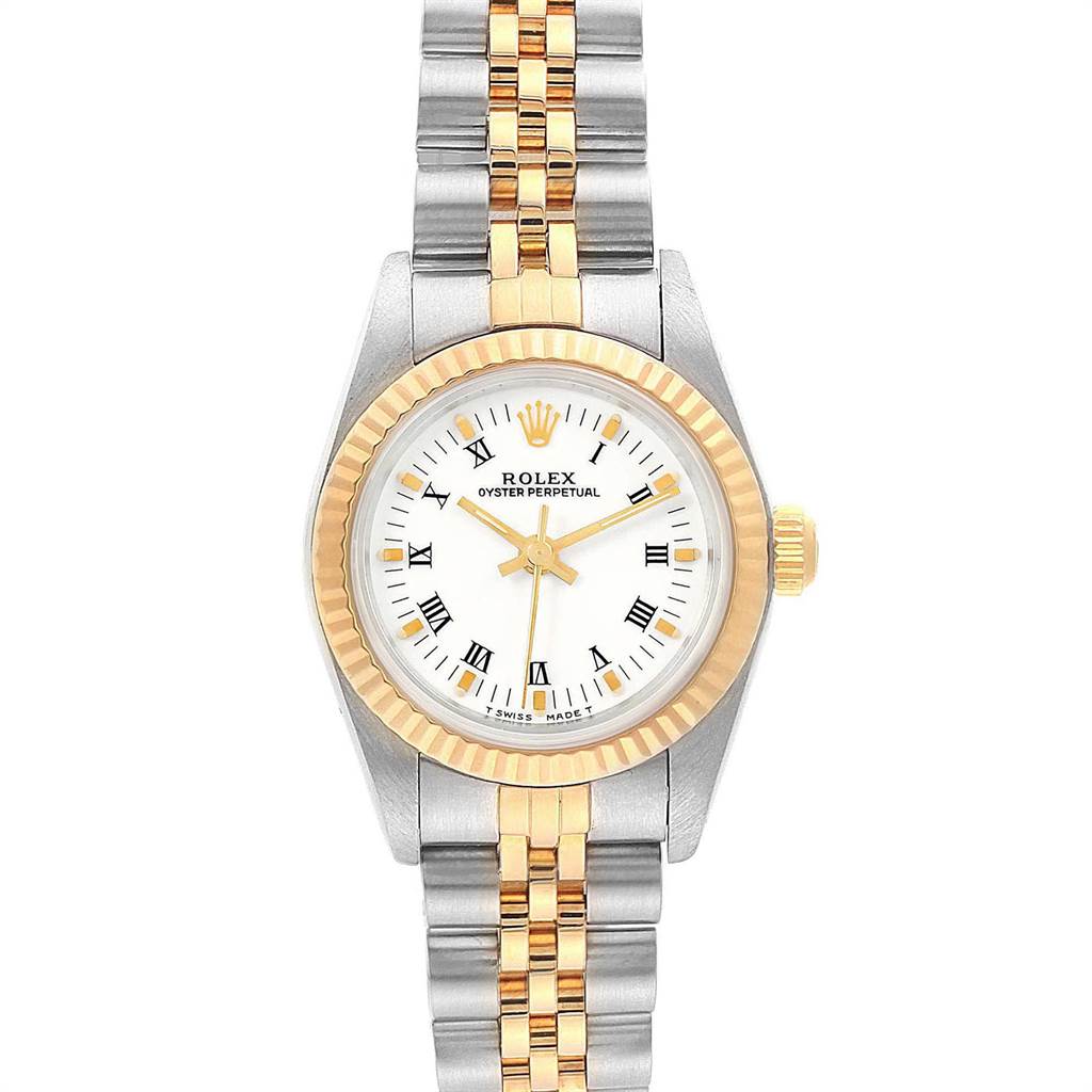 The image shows a Rolex Oyster Perpetual 67193 Women's Steel and Gold (two tone) White Dial 67193 Women's Steel and Gold (two tone) White Dial watch from a top-down angle, displaying its face, bezel, and two-tone bracelet.